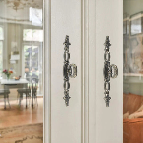 Vintage Style Antique Bronze Long Cabinet Handles 6.3 Inches, 2 Pack Hollow Drawer Pulls installed on white cabinet doors