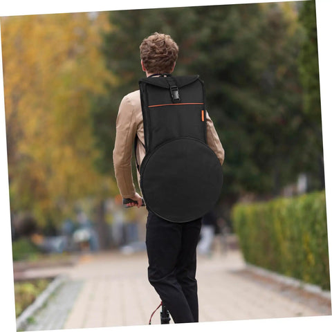 Person riding an electric scooter wearing a Flat Out Rugged Oxford Drum Pouch Waterproof Percussion Storage Case Built Boss Level For Studio Jams Gig Dates Weekend Campouts And Travel Hauls Black on their back.
