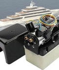 12V Marine Hydraulic Power Unit With Two Solenoid Valves Replacement Part for Bennett Marine Systems, with boat in background