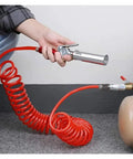 Heavy Duty Coiled Pneumatic Air Hose Reel That Retracts Like Magic To Tidy Up Workshop Messes Real Fast Plus Fits Most Standard Compressor Tools Like A Dream With Flexible Spiral Tube And Easy Plug Connections For Top Notch Airflow, red coil hose with air tool