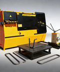 Badass CNC Rebar Stirrup Bender designed to crush heavy steel workloads, featuring curved and straight rebar shapes on display.