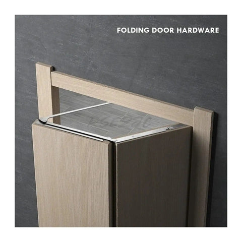 Slick 180 Degree Concealed Door Pivot Hinge For Solid Wood And Flat Folding Layouts Rock Solid Sky And Earth Axis Hardware view from above on wooden door frame.