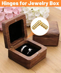 Open jewelry box with ring showing hidden brass barrel hinges set 30 pieces for DIY crafts and small boxes.