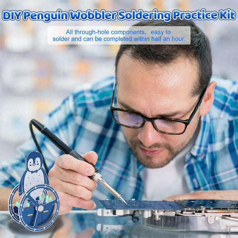 Man soldering electronics kit, DIY Penguin Soldering Kit With Motion Activated RGB Lights For STEM Education, close-up view.