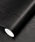 Peel And Stick Black Wood Grain Wallpaper For Counters And Cabinets, Self Adhesive Removable Wall Covering, Waterproof And Easy To Clean Vinyl Paper, Dope Durable Heat Resistant Surface For Kitchen, Furniture And DIY Projects, 17.71 In By 400 In showing a black roll of vinyl wallpaper