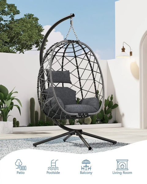 Outdoor Hanging Egg Chair With Stand Wicker Rattan Swing Chair With Cushioned Comfort on patio, white wall backdrop