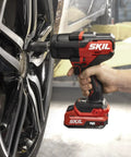 Tough As Nails Brushless Impact Wrench Delivering Eight Hundred Foot Pounds Of Mid Torque With Three Speed Settings Plug And Play Cordless Kit Includes Two Amp Hour Usb C Battery And Forty Five Watt Charger Plus Heavy Duty Sockets For Weekend Warriors in action on car wheel.