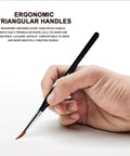 Detail Paint Brush Set Ten Miniature Brushes for Pro Level Fine Detailing and Art Painting in hand with ergonomic handle.