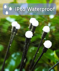 Close-up of Solar Garden Lights Outdoor 4 Pack Firefly Swaying Lights Waterproof Garden Decor demonstrating IP65 waterproof feature.