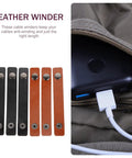 Premium Leather Cord Organizer Straps To Kick The Cable Chaos And Keep Your Setup Crisp While Traveling With Reusable Fasteners and Durable Flexible Wrap Ties, featuring black and brown leather winders.