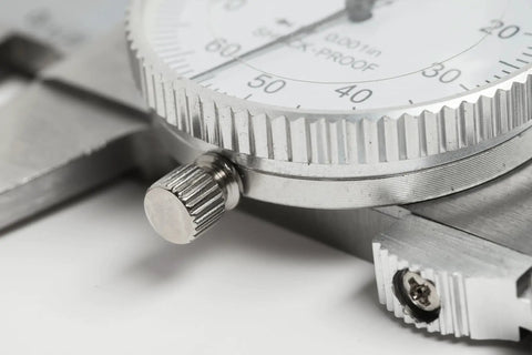 Close-up of the shock-proof dial on a 0-6 Inch Stainless Steel Dial Caliper With Shock Proof Dial And Pro Grade Precision.