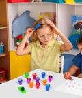Children using Science Party Stampers 24 Pack With 12 Designs for science birthday parties and school events.