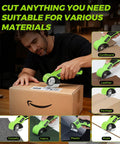 Heavy Duty Cordless Electric Scissors With Led Light And Safety Lock cutting cardboard and various materials on a table.