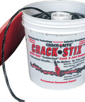 Self Leveling Blacktop Crack Repair Black Rubber Thermoplastic Joint Sealant For Asphalt Driveways Quarter Inch Diameter Two Hundred Fifty Foot Roll Contractor Grade Patch in a bucket.