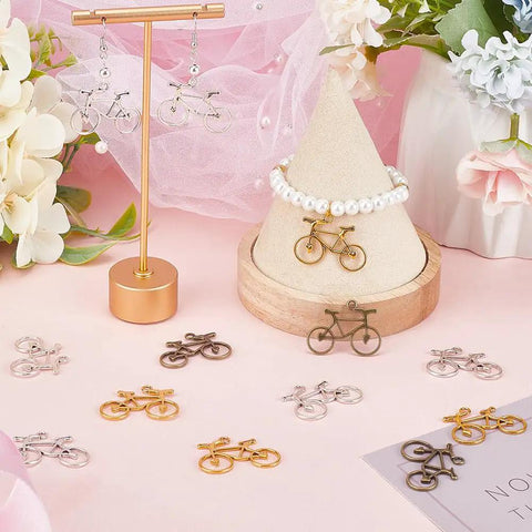 Bike Charms Bulk Set 60 Pieces In Gold Silver Bronze for Jewelry Making DIY, shown as earrings and bracelet display.