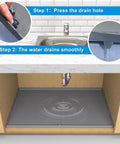 Under Sink Silicone Mat 28 By 22 Inch Waterproof Flexible Liner With Drain Hole Gray for Kitchen Cabinet Showing Drainage Process