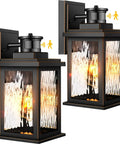 Two Pack Motion Sensor Outdoor Lights With Dusk To Dawn LED Exterior Wall Sconces in black with motion icons, waterproof and anti-rust design.