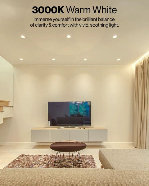 Living room with 4 Inch Retrofit LED Recessed Can Lights Dimmable Warm White 3000K illuminating the ceiling.