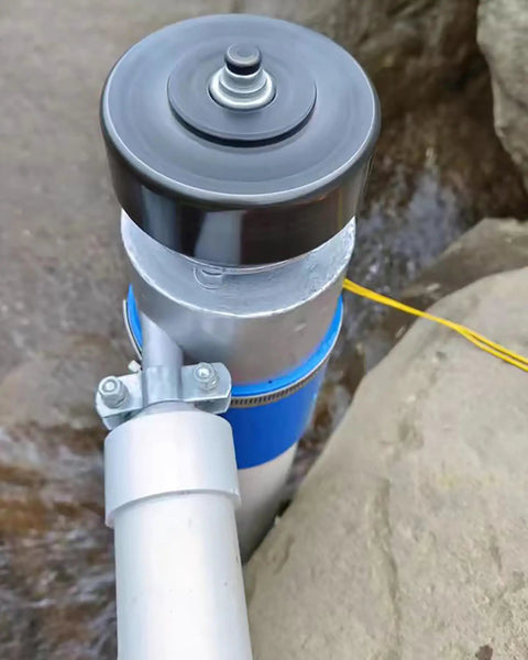 Close-up view of a 1000W Portable Micro Hydroelectric Generator with water turbine, showing bearing outlet and smooth impeller rotation.