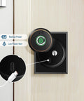 Smart Fingerprint Deadbolt With App Bluetooth For Front Door Keyless Entry Lock 0.3 Second Unlock Biometric 360 Degree ID No Key Fumbles Back Up Keys Electronic Door Knob Three In One Unlock For Home Security installed on wooden door showing fingerprint scanner.