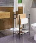 Freestanding 3 Tier Towel Rack Stand With Storage Shelf Black Metal in bathroom with towels and linens displayed