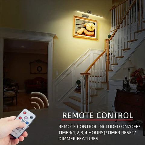 Cordless 16 Inch Picture Light With Timer And Dimmable LED illuminating wall art in stairway with remote control use
