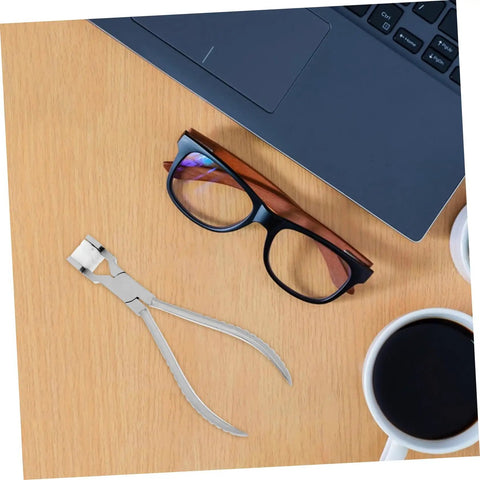 Stainless Steel Eyeglasses Frame Bending Pliers Pro Grade Gear Optical Repair Tool on desk with eyeglasses and laptop