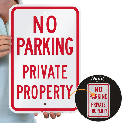 Tough As Nails No Parking Private Property Sign 12 X 18 Inch Heavy Duty Aluminum Sheet held by a person with clear red text.