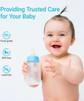 Smiling baby holding a BPA-free and lead-free baby bottle with food-grade quality.