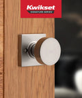 Pismo Dummy Door Knob For Interior Doors on wooden door, satin nickel finish, Kwikset brand, no turn handle, square base