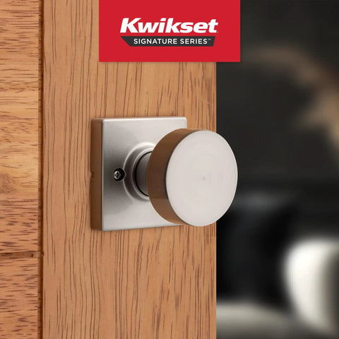Pismo Dummy Door Knob For Interior Doors on wooden door, satin nickel finish, Kwikset brand, no turn handle, square base