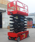 Heavy Duty Electric Hydraulic Lift Platform For Warehouse Vertical Cargo Transfer And Seamless Operation Engineered For Logistics Facilities With Rock Solid High Reach Equipment Handling Built Tough For Daily Grind, red scissor lift in warehouse.