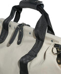 Close-up of handle and straps on Canvas Tool Bag With Leather Bottom And Wide Opening For Easy Access, 18 Inch, 11 Pockets.