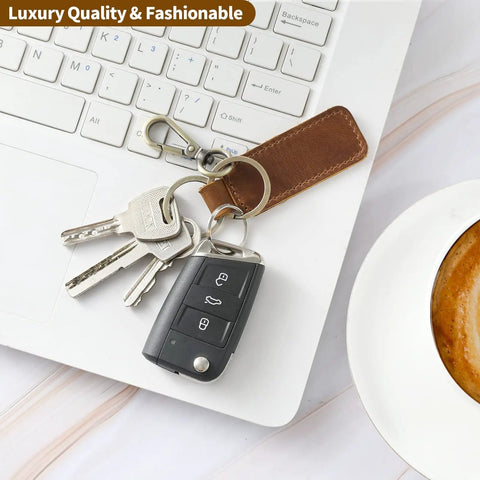 Dope Genuine Leather Keychain For Cars And Everyday Keys, Universal Key Fob Holder With Heavy Duty Carabiner Clip, Legit Anti Loss Key Organizer, Slick Real Leather Gear For Men And Women with keys on a laptop.
