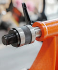 Live tailstock chuck adapter with 1" x 8TPI threads and #2 Morse taper mounted on orange lathe tailstock
