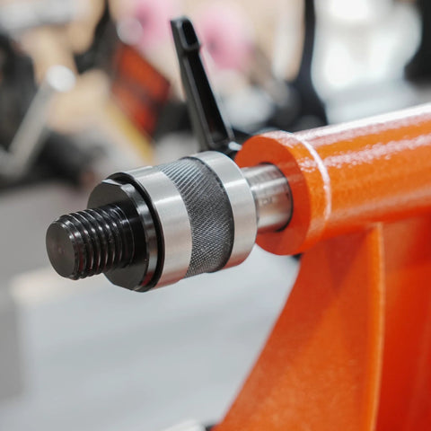 Live tailstock chuck adapter with 1" x 8TPI threads and #2 Morse taper mounted on orange lathe tailstock