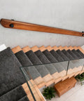Built Tough Wall Mount Wood Handrail With Industrial Pipe Brackets For Indoor Staircases Hallways And Landings Smooth Non Slip Surface No Sweat Setup Dark Wood Nine Foot above wooden stairs with grey carpeting