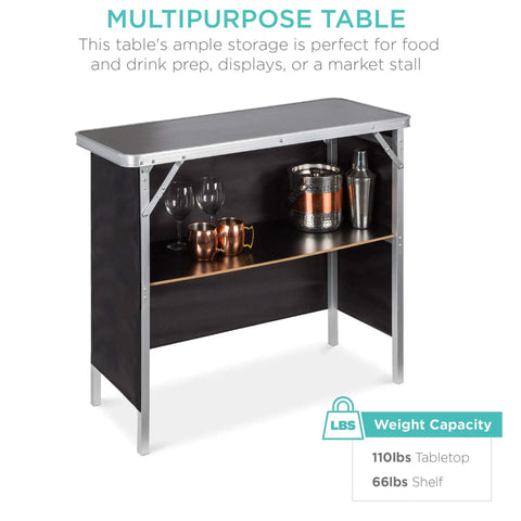 Portable Pop Up Bar Table For Indoor Outdoor Parties And Tailgates With Carrying Case Storage Shelf Removable Skirt Party Ready For Picnics Entertaining And Easy Setup 110 Pound Weight Capacity with glasses and mugs on shelf.