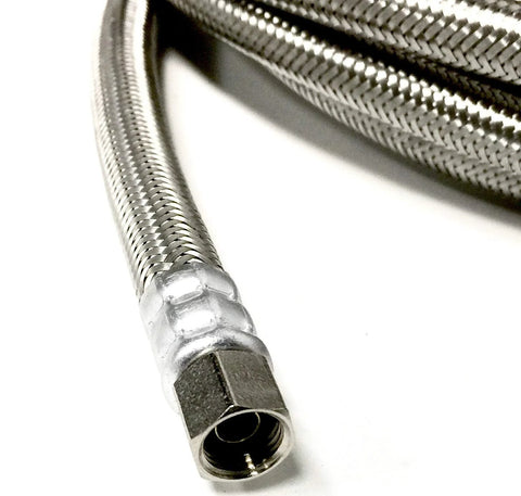 Stainless steel braided ice maker hose with 1/4 inch compression fittings, close-up end view