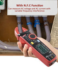 Clamp Meter Multimeter With Non Contact Voltage Tester For 2A AC DC in use, measuring AC voltage on electrical panel UT210E