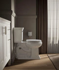 Bathroom with standard toilet featuring Stonewood Round Wood Toilet Seat With Color Matched Hinges For Standard Toilets White Compression Molded Wood Design.