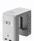 Under Desk Mount Power Station With 6 Outlets And 1080 Joules Of Surge Protection, USB C Plus Two USB A Ports Delivering 4.8A Total, Desk Clamp Power Strip For Home Office Or Cubicle, White Finish. Product shown on a grey background, displaying USB ports and AC outlets.