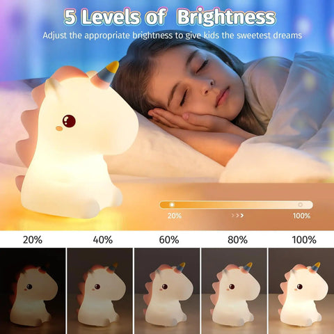 Child sleeping next to illuminated Unicorn Night Light For Kids With Sound Machine, 16 Color Silicone Baby Night Lamp USB Rechargeable