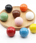Bold Red Ceramic Dresser Knobs Six Pack Smooth Drawer Pulls Snag And Go Install, featuring colorful round pulls on a wood plate.