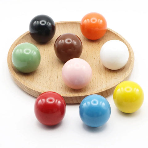 Bold Red Ceramic Dresser Knobs Six Pack Smooth Drawer Pulls Snag And Go Install, featuring colorful round pulls on a wood plate.