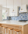 Ceramic Blue and White Pendant Light,Porcelain Light Fixture Kitchen Island hanging above a kitchen island with wooden stools.