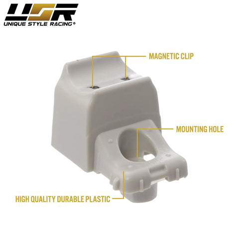 Close-up of Tesla Model 3 Magnetic Sun Visor Clip Upgrade Kit showing magnetic clip and mounting hole, made of durable plastic.