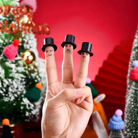 Hand with fingers wearing mini black top hats, part of Awesome Christmas Craft Button Kit With 700 Pieces for holiday decor projects