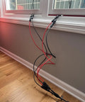 6 Ft 10AWG Solar Extension Cable Kit With Male And Female Connectors attached to a window frame, showing Y Branch cables.