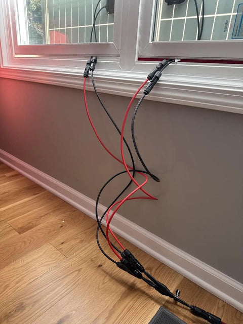 6 Ft 10AWG Solar Extension Cable Kit With Male And Female Connectors attached to a window frame, showing Y Branch cables.